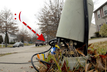 Comcast Installs Cable In Your Gutter, Across Your Driveway