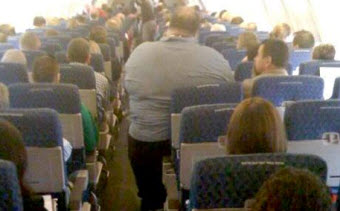 Passenger Of Size Allegedly Has Picture Taken By Flight Attendant