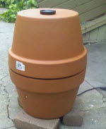 Make A DIY Meat Smoker Out Of Some Flower Pots