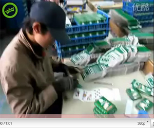 Video: Chinese Factory Workers Stuffing Playing Cards At Turbo Speed