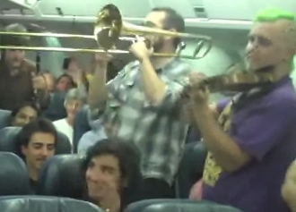 Delayed Air Canada Passengers Pass Time With Free In-Plane Concert