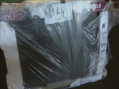 Scammers Sell Plywood Wrapped In Black Tape As 50" Flat
Screen