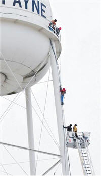 Comcast Installer Dangles From Water Tower For 1.5 Hours Before Rescue