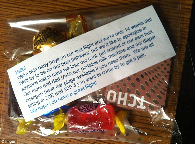 Parents Of Twin Tots Appease Fellow Travelers By Handing Out Bags Of Candy, Ear Plugs