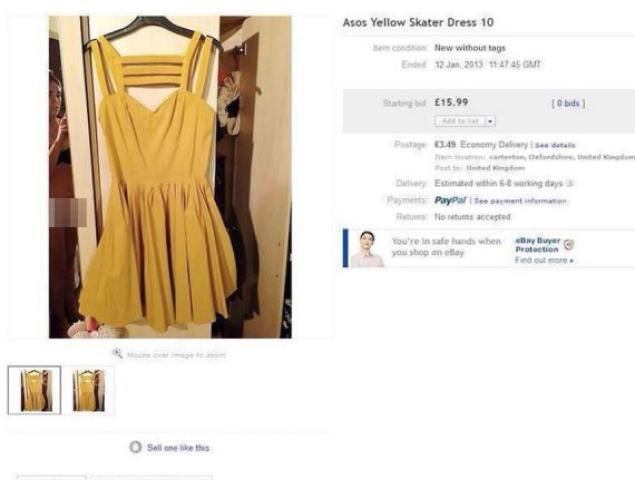 The seller of this dress didn't realize she could be seen, sans undies, in the reflection on the left.