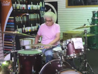Mysterious Rockin’ Grandma Awes Music Store Staff On Drums, Disappears