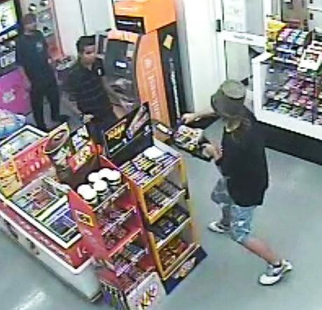 This is a screengrab from actual CCTV footage of the teen attempting to rob a 7-Eleven with a chainsaw and, yes, a flower-pot helmet.