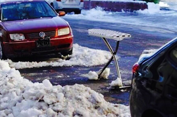 “Saving” A Shoveled-Out Parking Spot: Your Hard-Earned Right Or A Jerk Move?