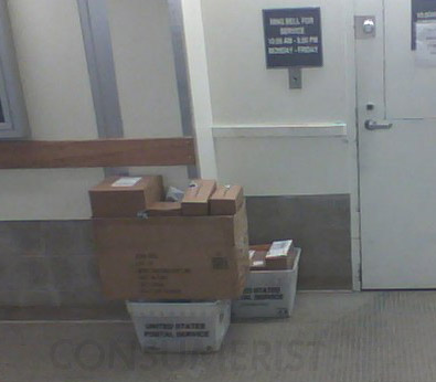 My Post Office Stacks Mailed Packages On Lobby Floor, Shrugs