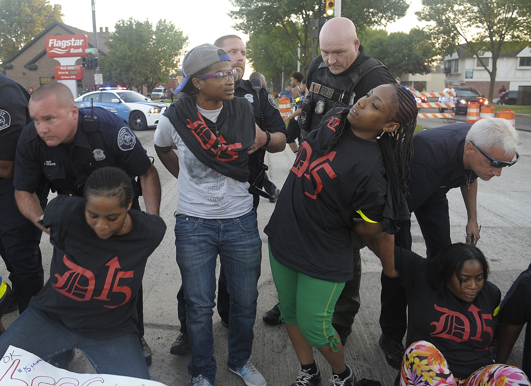 Protestors arrested outside of a Detroit McDonald's (photo courtesy of Detroit15.org)