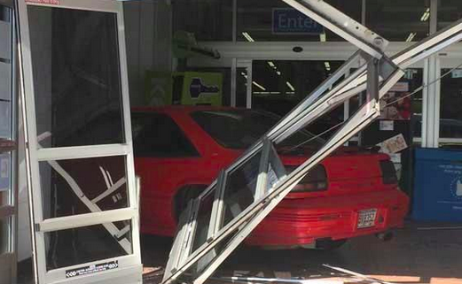 A former Walmart employee drove his car into the store's entrance. Photo courtesy of KPLC.