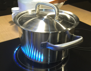 The Samsung Virtual Flame stove top uses induction heating and LED lights to show the intensity of heat. 