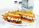 Denny's 1,690-Calorie Sandwich Tops Beef Patty With Mac & Cheese