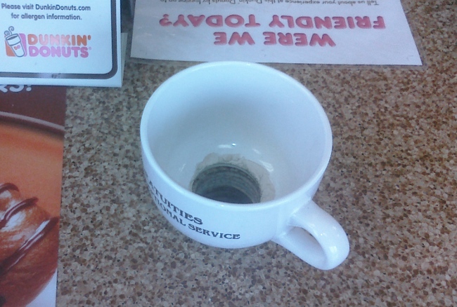 This Dunkin' Donuts Tip Cup Has Trust Issues