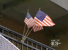Elderly Woman Faces Eviction From Apartment For American Flags On Balcony