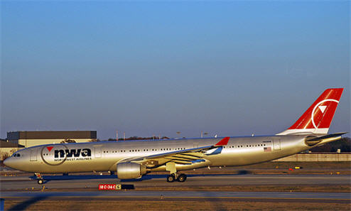 Northwest Airlines Begins Charging $15 For First Checked Bag Today