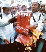 Indonesian Muslims Riot Over Fully Clothed Playboy Babes