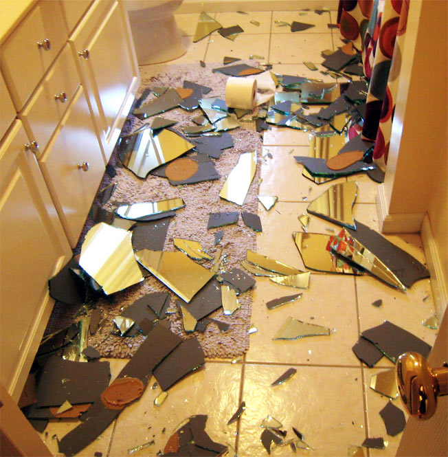 Mirror Shatters To Floor, Installer Shrugs