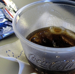 US Airways Reverses Fee, Sodas Free!