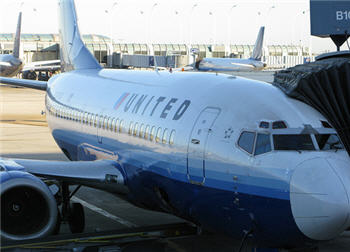 United Airlines Offers Drinks To "The Idiots In Coach"