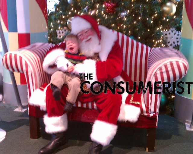 Greg writes: "Here is my son Eli at a mall on Long Island, N.Y. He did not like santa last year or this year at all!"