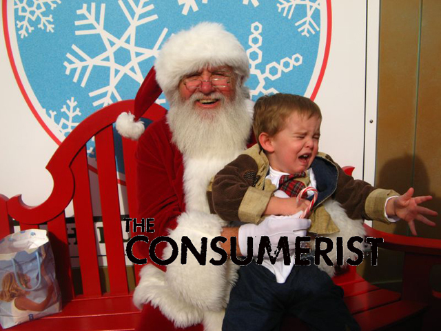 Shanna writes: "This is from a few years ago, but it's still a great shot. This is my son Seamus and Santa in Destin, FL. And he's such a good Santa - pity my son didn't agree!"