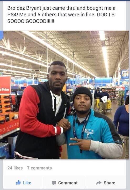 Dez posing for a photo with one of the lucky Walmart shoppers last night.