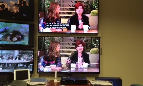 WRAL's demonstration of the problem. The top screen shows the over-the-air feed for the station. The bottom screen shows what happens when a Verizon customer gets a text message in the same room as the set-top box (see below for full clip).