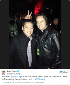 T-Mobile CEO John Legere, right, with CNET's Roger Cheng at the AT&T CES event on Monday night.