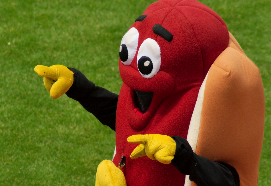 If you are served a 7-foot-tall anthropomorphic hot dog with a permagrin, then the odds are you purchased a mascot and not a quick lunch. (Matthew Hunt)