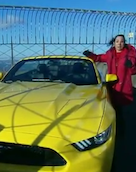 Just What Tourists At The Empire State Building Needed: A Ford Mustang Blocking The View