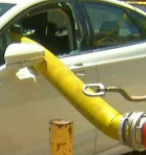 Car With Smashed Windows Yet Another Example Of Why You Don’t Park In Front Of Fire Hydrants