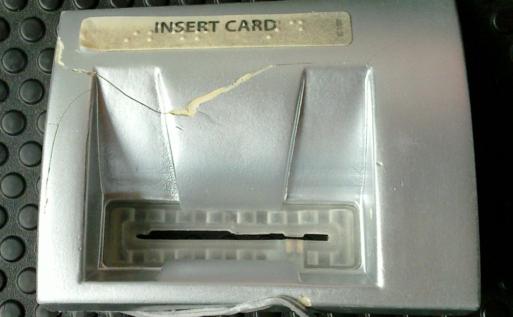 One example of a skimming device that's been ripped from an ATM. Diebold thinks that changing the orientation of a machine's card reader will help stop skimming. (photo: Aaron Poffenberger)