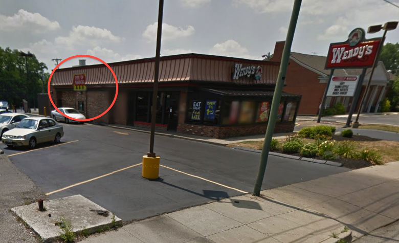 The employee was pulled through that wee window and then further assaulted by the customer. (Photo: Google Maps)