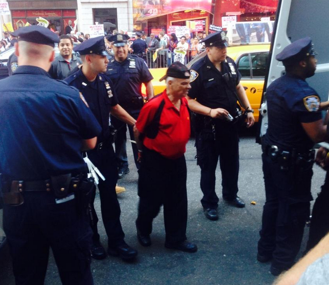 A Times Square protestor being arrested this morning (photo: Pete Nagy)