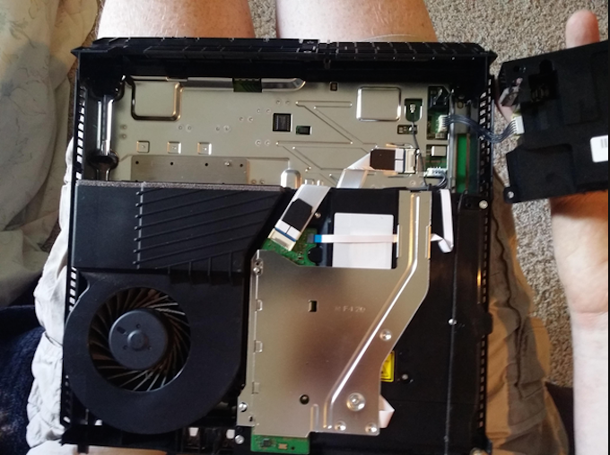 Levi finally gave up hope and took apart his PS4 searching for bugs and dust.