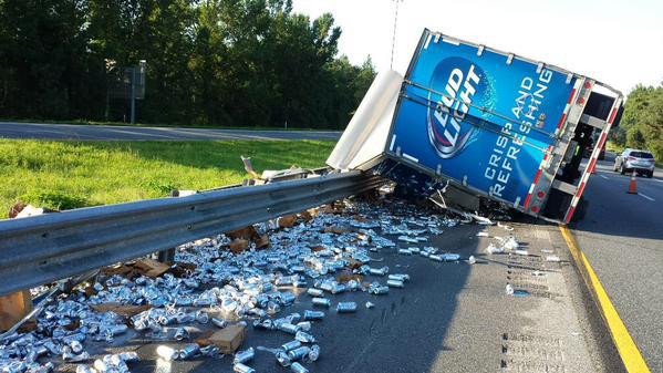 A semi full of Natural Light beer overturned Tuesday spilling its contents across a Florida highway. 