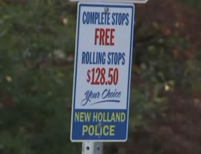 Police Put Up Signs To Remind Motorists How Stop Signs Work